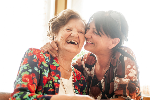 mother and daughter laughing